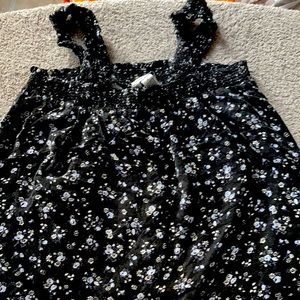 Black top , little flower designs for , size M